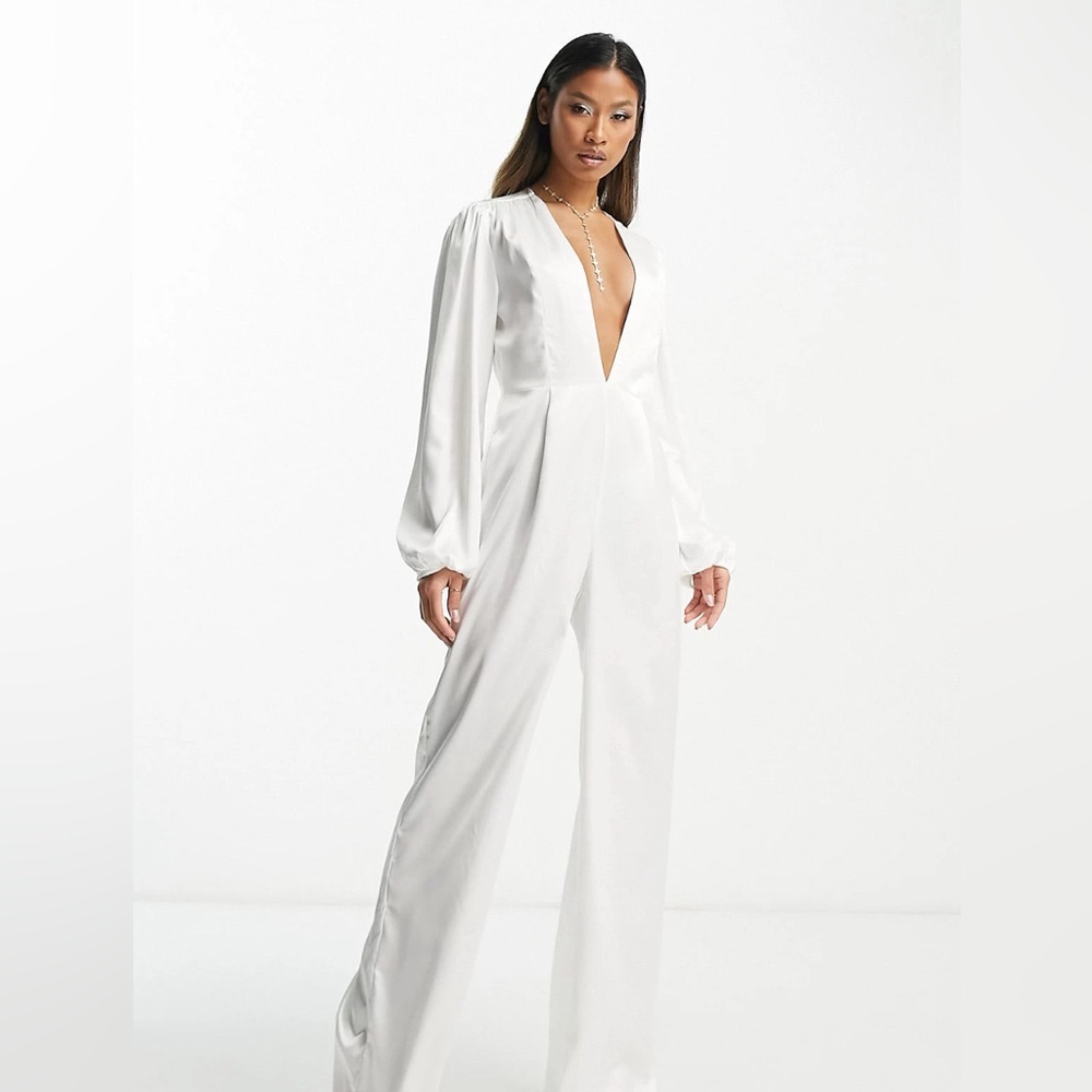 Plunge front satin jumpsuit w balloon sleeves. Wore for a few hours. Dry cleaned